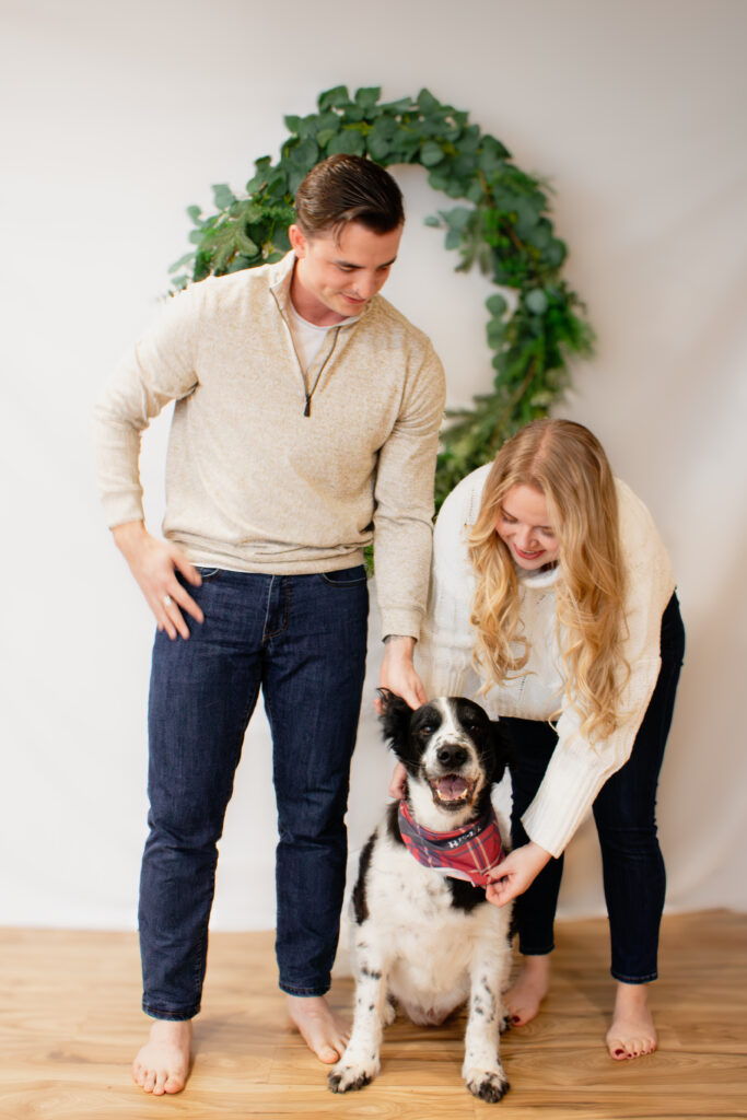 Couple and dog photographed during Roseburg Oregon Christmas Mini session by McKenzie Strong Photography.