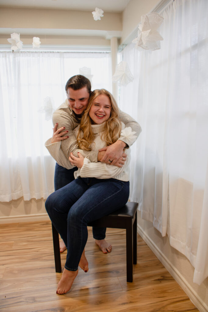 Roseburg couple posing for Christmas mini photos at indoor studio