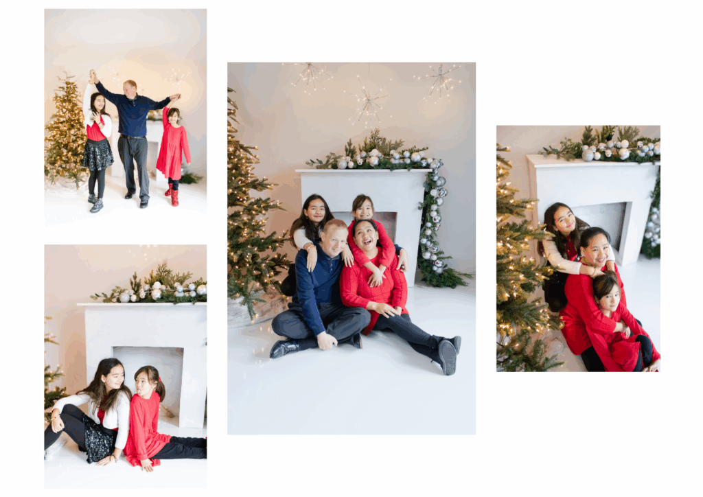 Family smiling together by a decorated fireplace during studio Christmas minis in Roseburg Oregon.