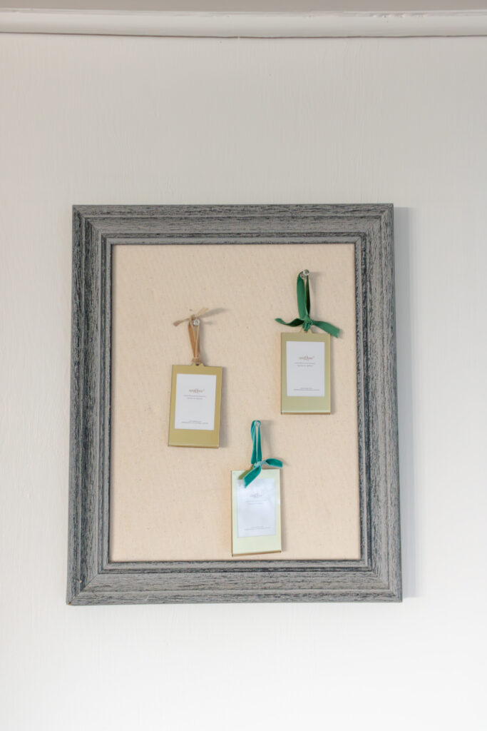 Session gift from McKenzie Strong Photography which includes a polaroid photo from session and a framed ornament.