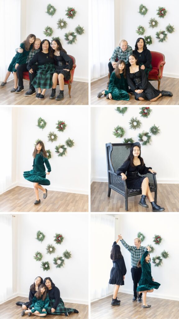 family photographed during a Roseburg Oregon Christmas mini session, featuring parents and children posing and playing together in a bright studio with holiday wreaths